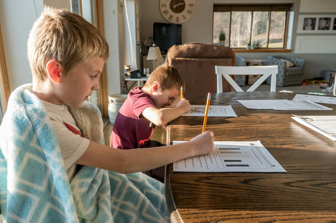 parents helping kids with homework