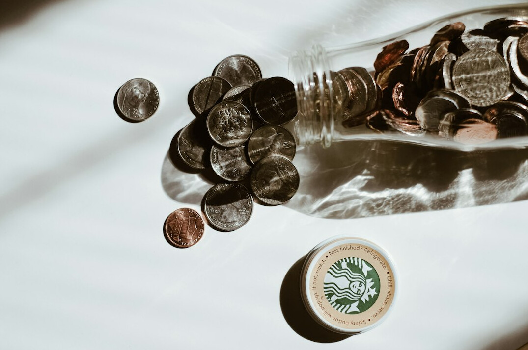 savings jar with coins